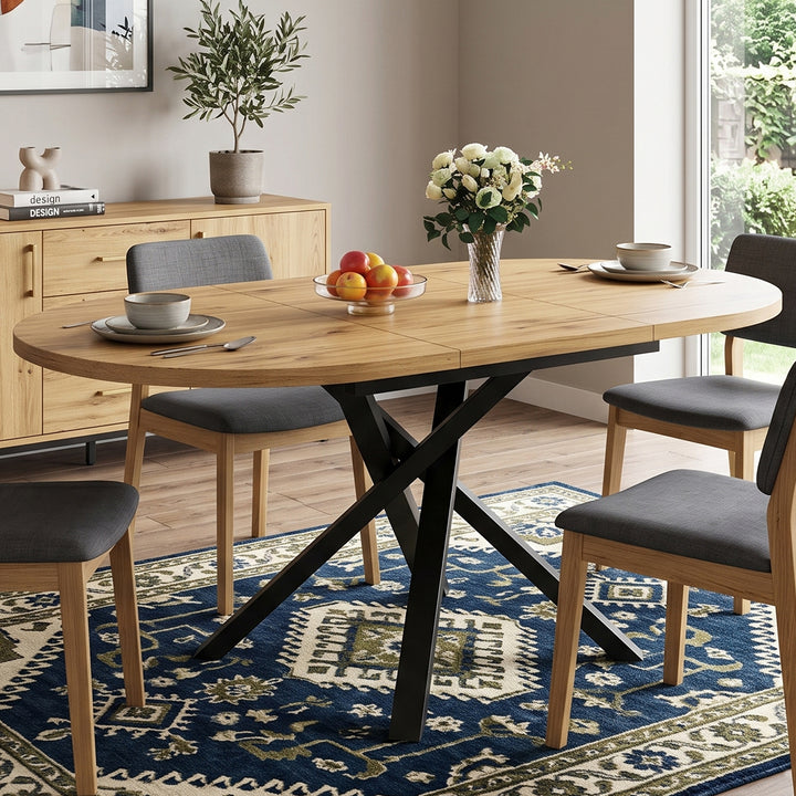Wooden extendable round to oval dining table 100-140cm CONSOLEMAX