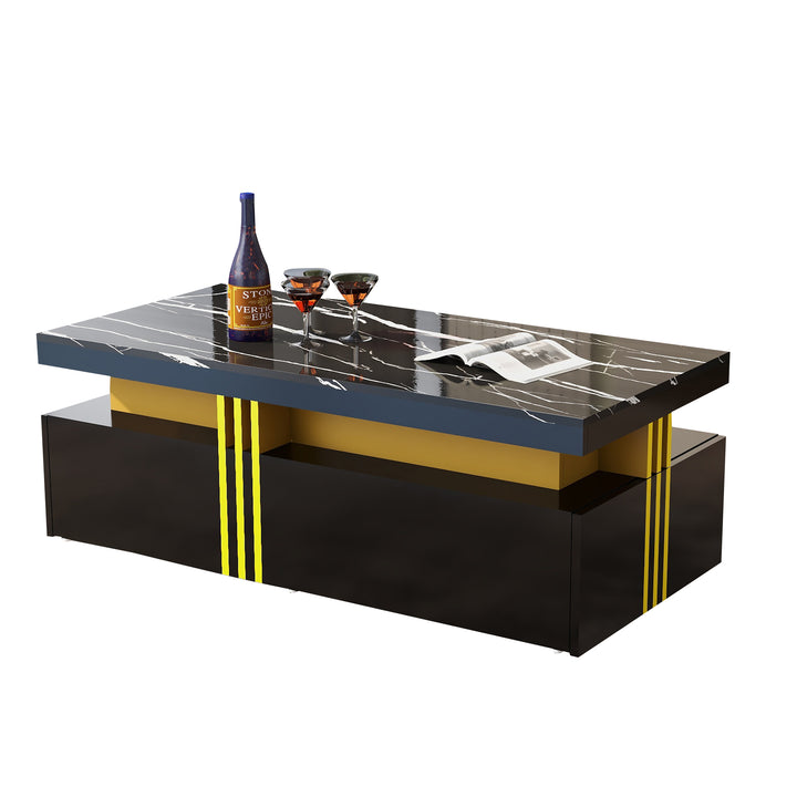 Modern black coffee table with marble-pattern top golden accents LEDGER