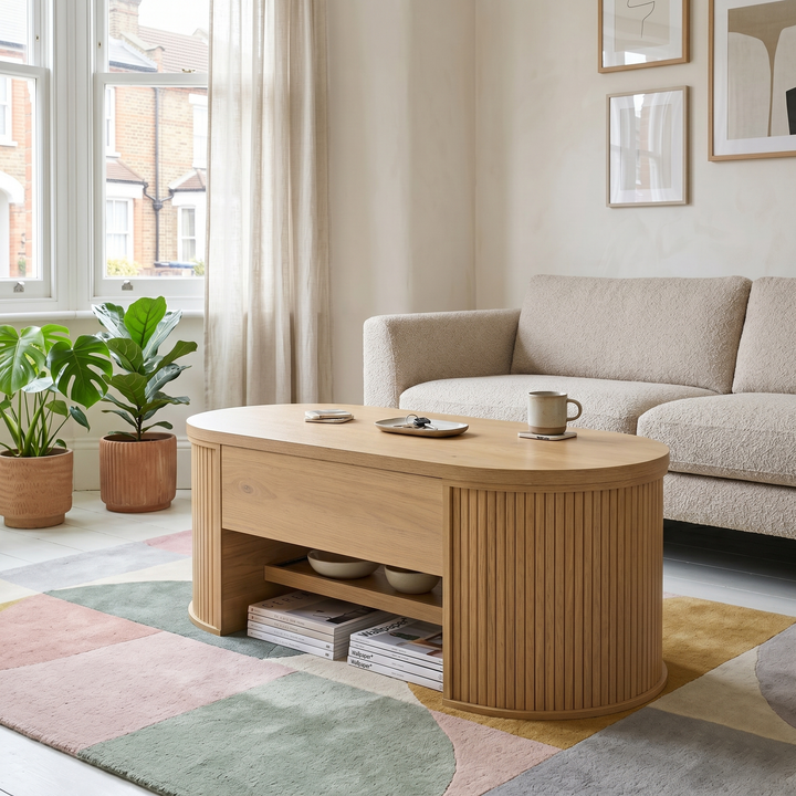 Light wooden oval lift-top coffee table with hidden storage and tray, rounded fluted design CONCRETEPILLOW