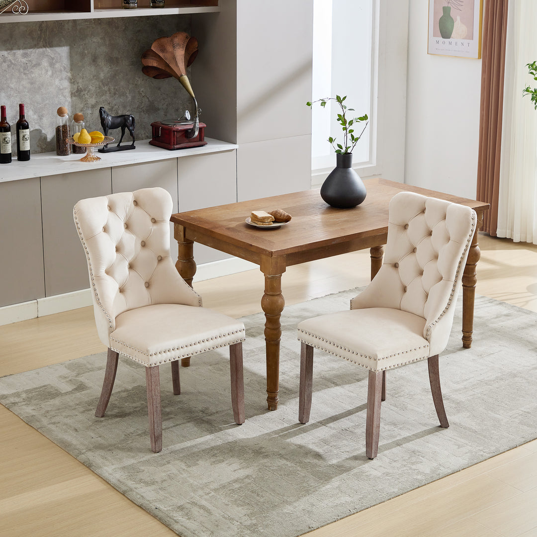 Set of 2 upholstered velvet beige dining chairs button tufted with ring knocker wooden legs TASTRAN BEIGE UK
