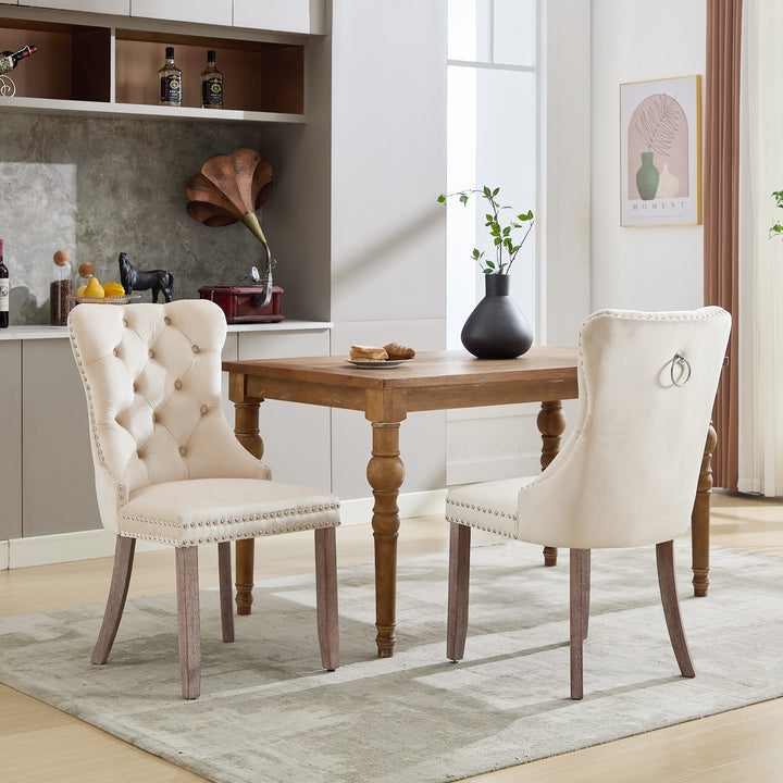 Set of 2 upholstered velvet beige dining chairs button tufted with ring knocker wooden legs TASTRAN BEIGE UK