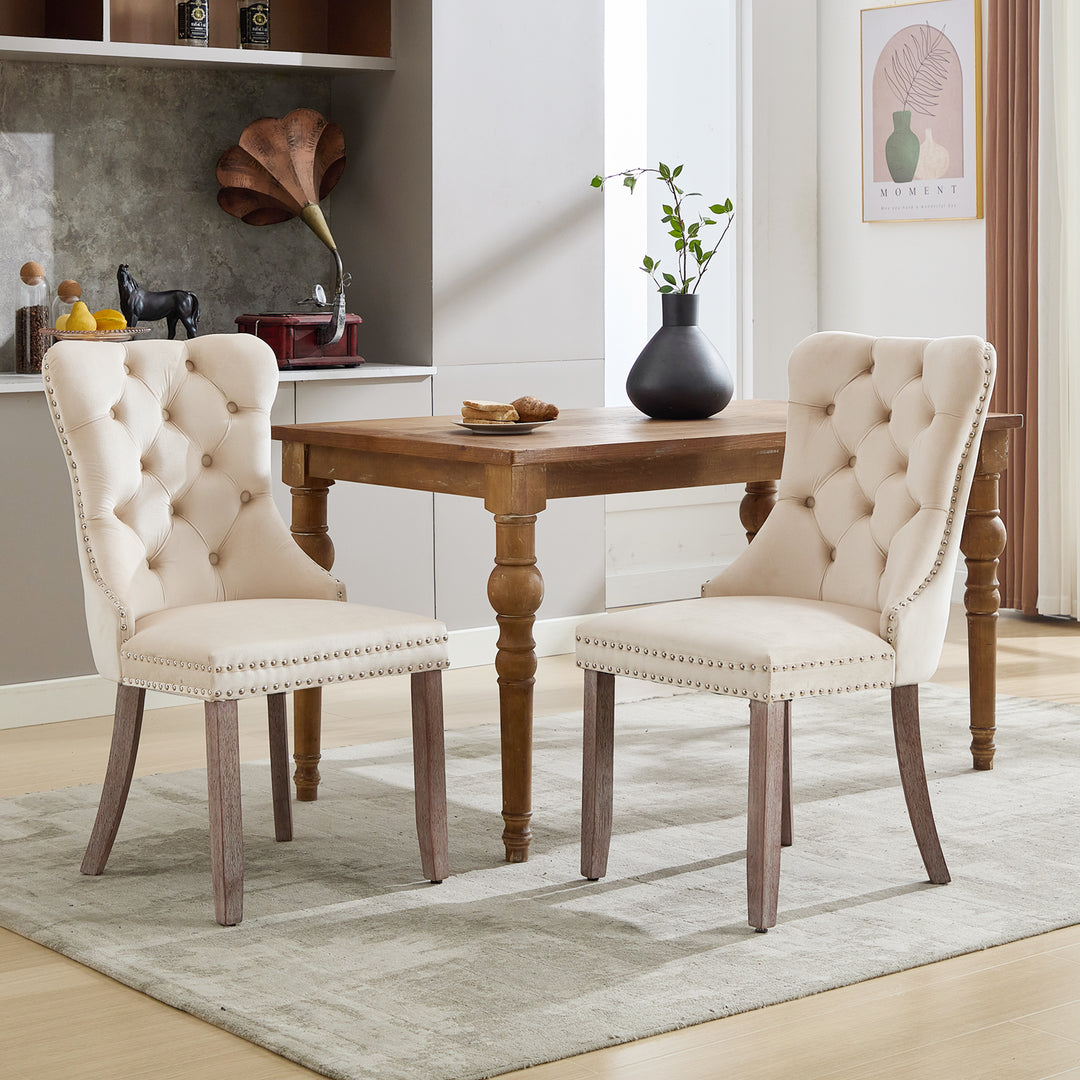 Set of 2 upholstered velvet beige dining chairs button tufted with ring knocker wooden legs TASTRAN BEIGE UK