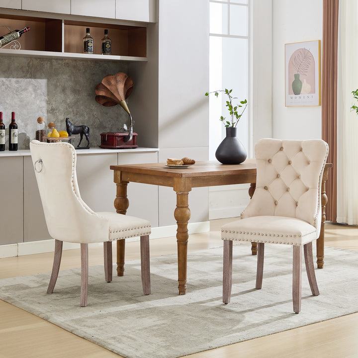 Set of 2 upholstered velvet beige dining chairs button tufted with ring knocker wooden legs TASTRAN BEIGE UK