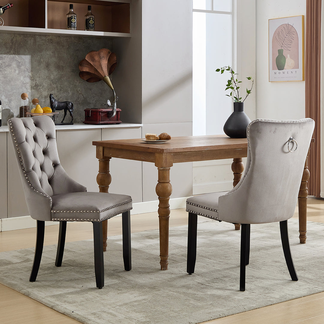 Set of 2 upholstered velvet grey dining chairs button tufted with ring knocker wooden legs TASTRAN GREY UK