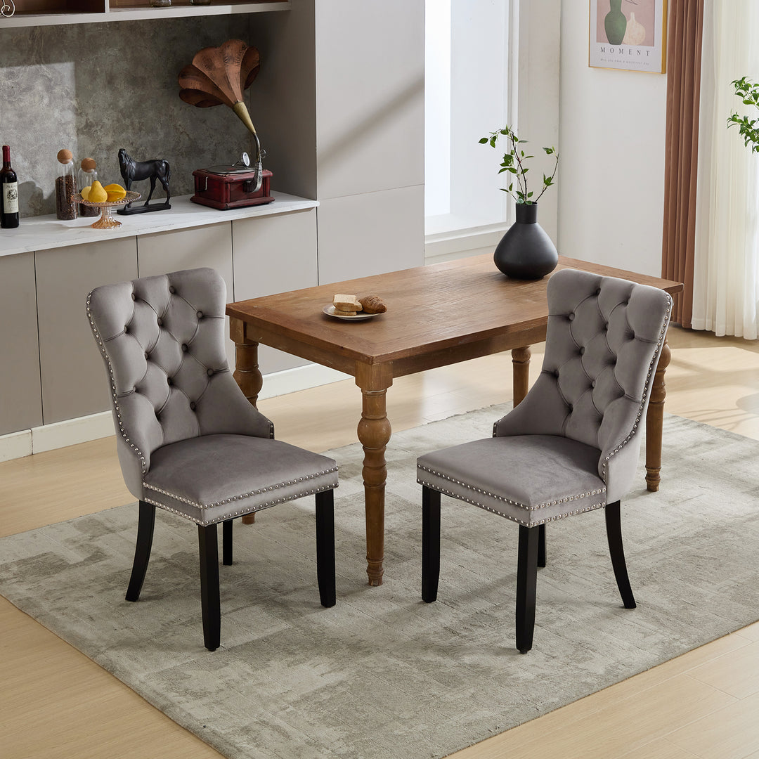 Set of 2 upholstered velvet grey dining chairs button tufted with ring knocker wooden legs TASTRAN GREY UK