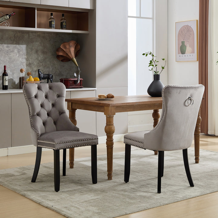 Set of 2 upholstered velvet grey dining chairs button tufted with ring knocker wooden legs TASTRAN GREY UK