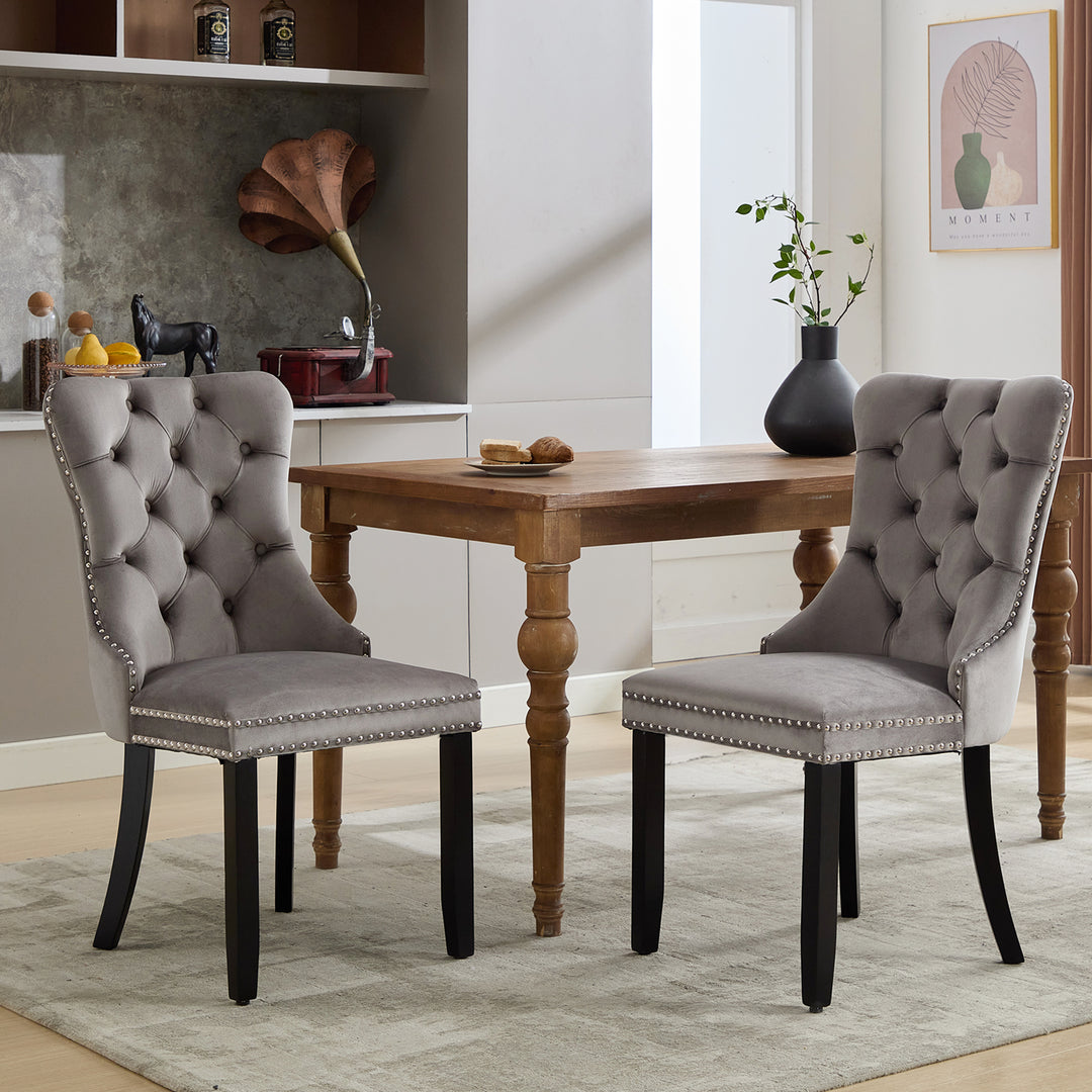 Set of 2 upholstered velvet grey dining chairs button tufted with ring knocker wooden legs TASTRAN GREY UK