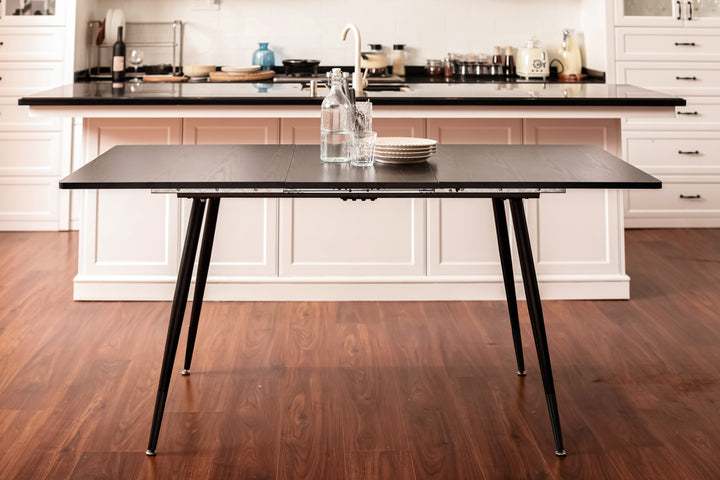 Rectangular extendable black dining room table with Scandinavian style wood effect gold dot feet 120-160 cm WHALEN DARK WOOD STRETCH TABLE BG